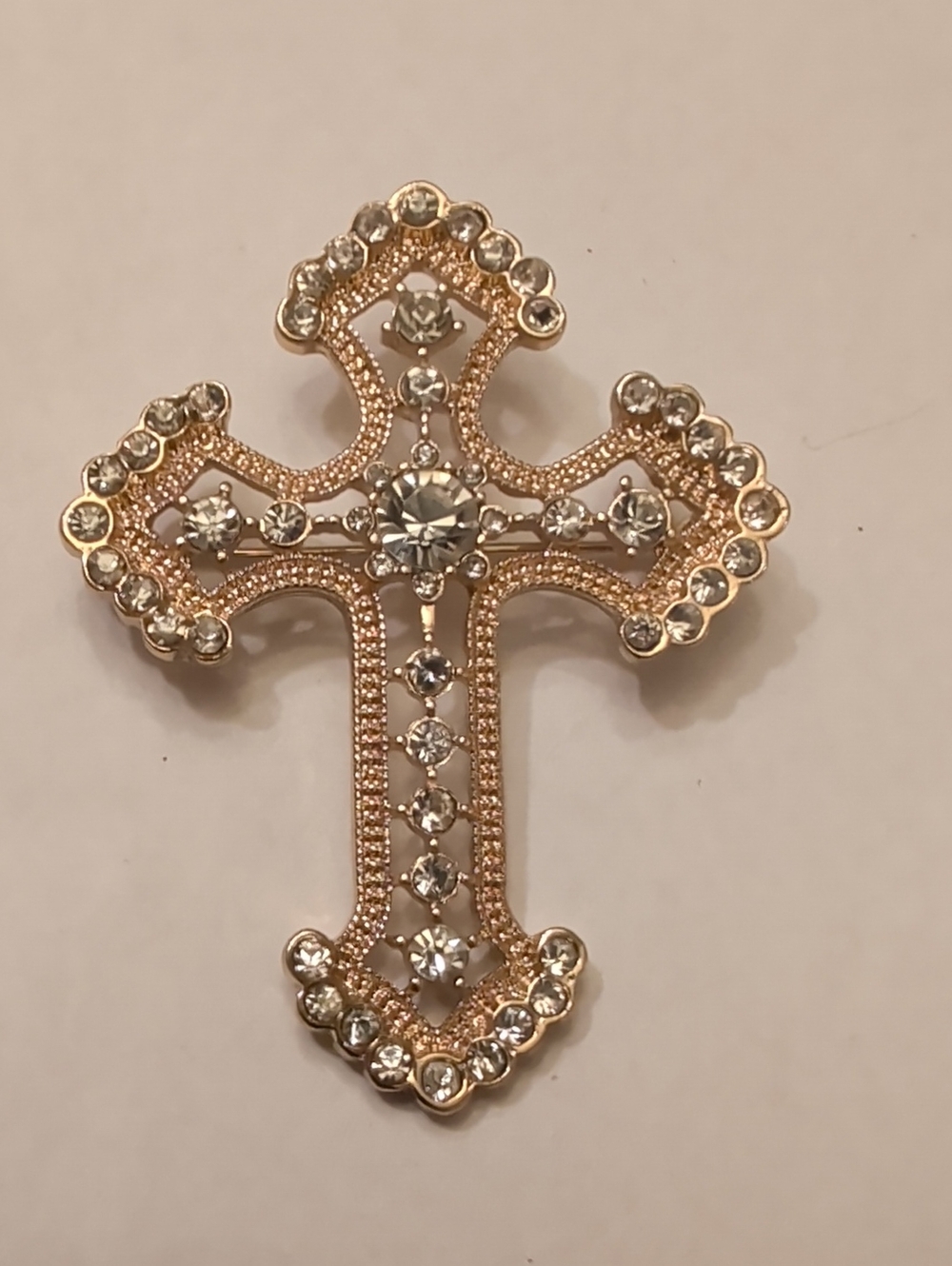 Rhinestone Cross Brooch in Gold Tone